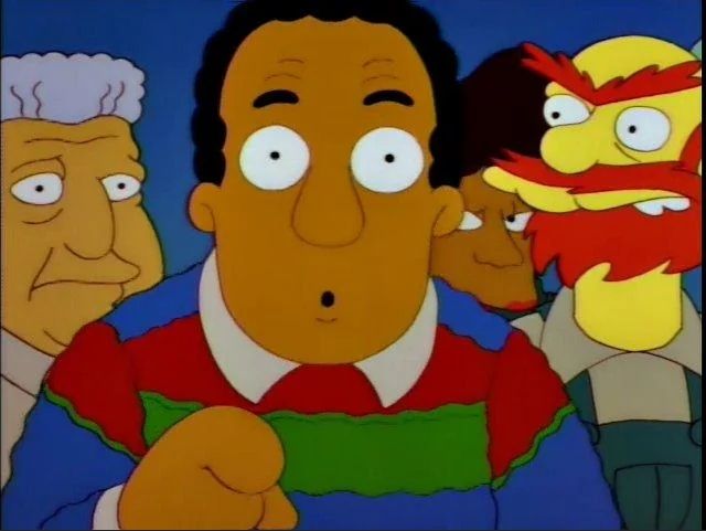 Dr Hibbert off of The Simpsons pointing at the camera. 