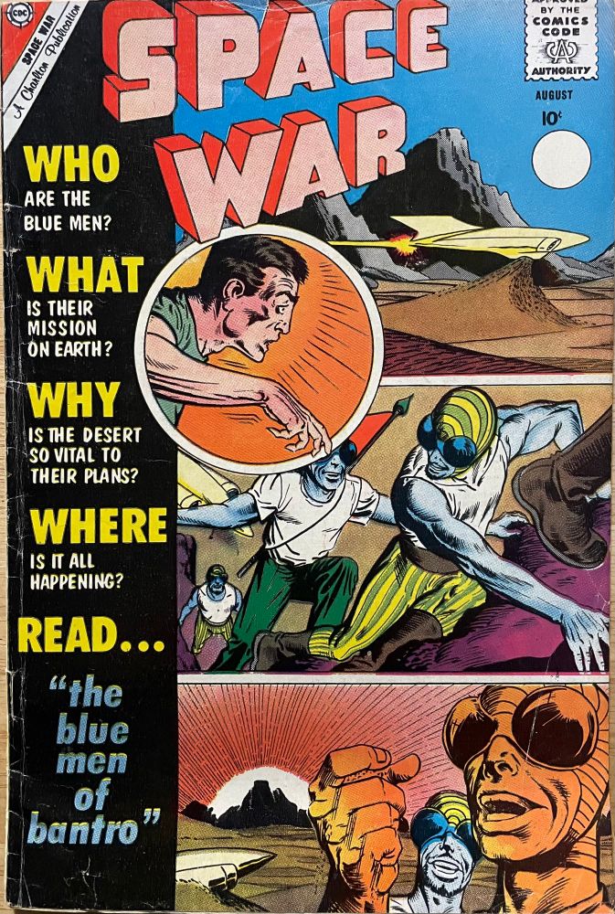 Three panels show a spacecraft landing, blue men emerging, and the blue men standing triumphant. In a circular inset panel, an earth man looks shocked. 
