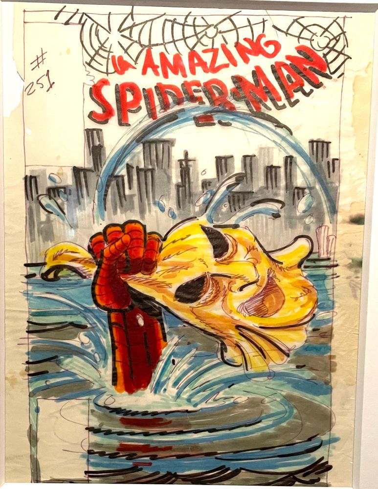 Spider-Man’s hand emerges from the water holding the Hobgoblin’s mask 