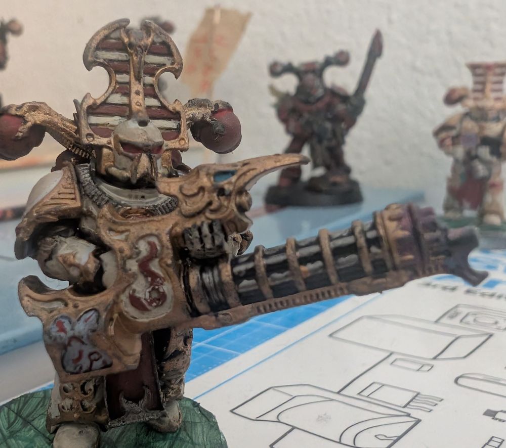 Ivory and red rubric marine with soulreaper cannon. 