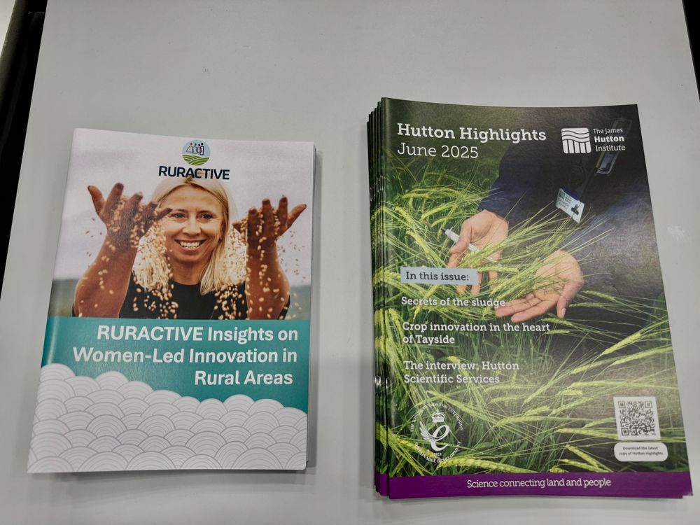Two stacks publications on a table: one of booklets titled ‘RURACTIVE Insights on Women-Led Innovation in Rural Areas’ and another of brochures titled ‘Hutton Highlights, June 2025.