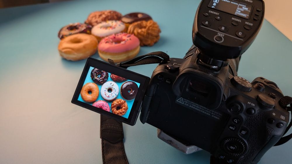 Donuts being photographed for work. 