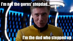 Christopher Pike standing on a transporter pad with the caption "I'm not the gorns' stepdad, i'm the dad who stepped up"