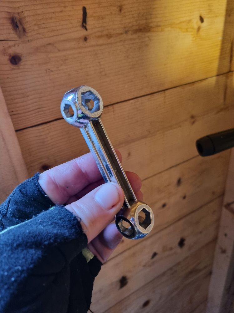 Il-rinse fá choinne rothar - an old multi-wrench tool for bikes.