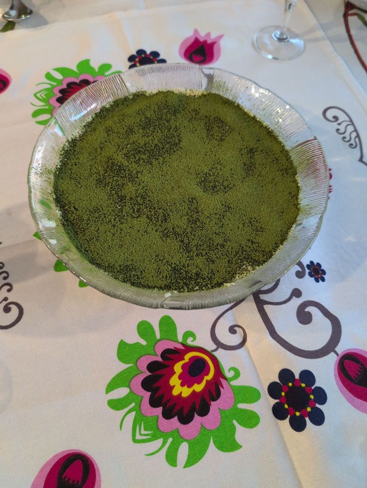 A green matcha-misu - tiramisu with matcha instead of coffee.