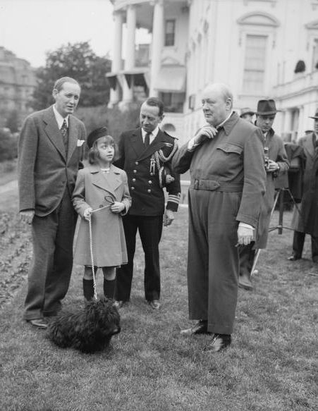 Winston Churchill outside the Whitehouse, dressed in his air raid suit. January 1942.