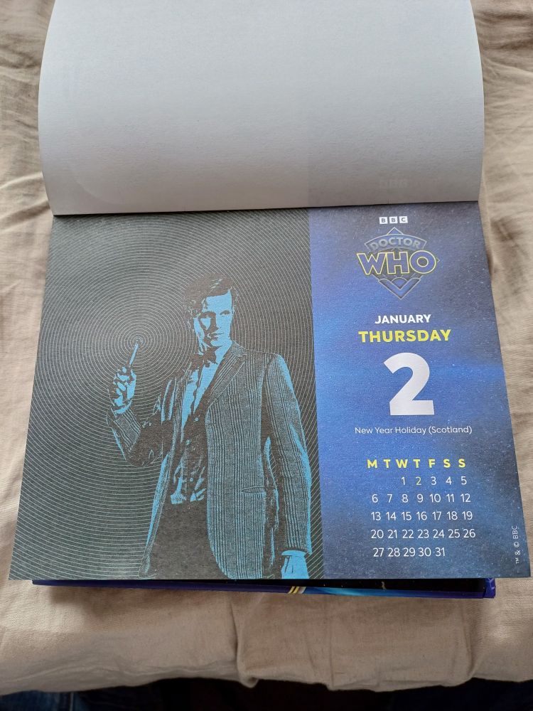 Jan 2 desk calendar page featuring artwork of Matt Smith as the Doctor.