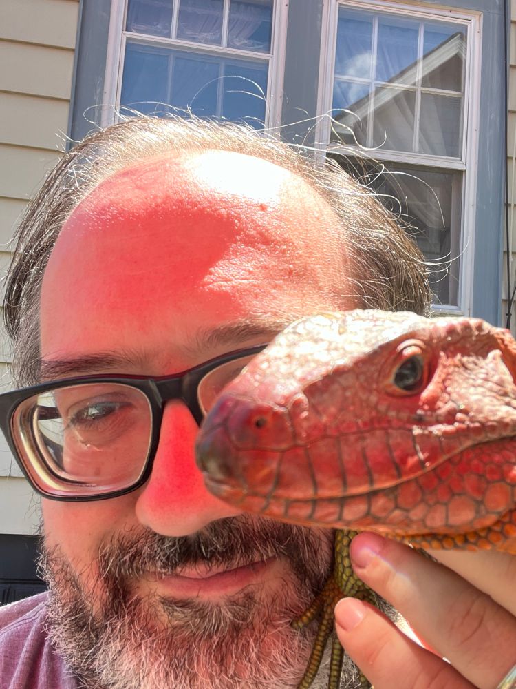 Me and Neel, a caiman lizard, a very large teiid with a bright red head