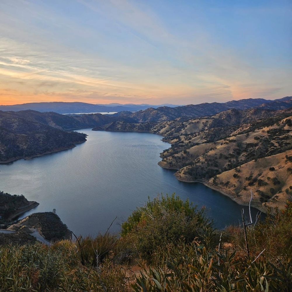 Sunset photo taken from a bench overlooking Lake Berryessa 