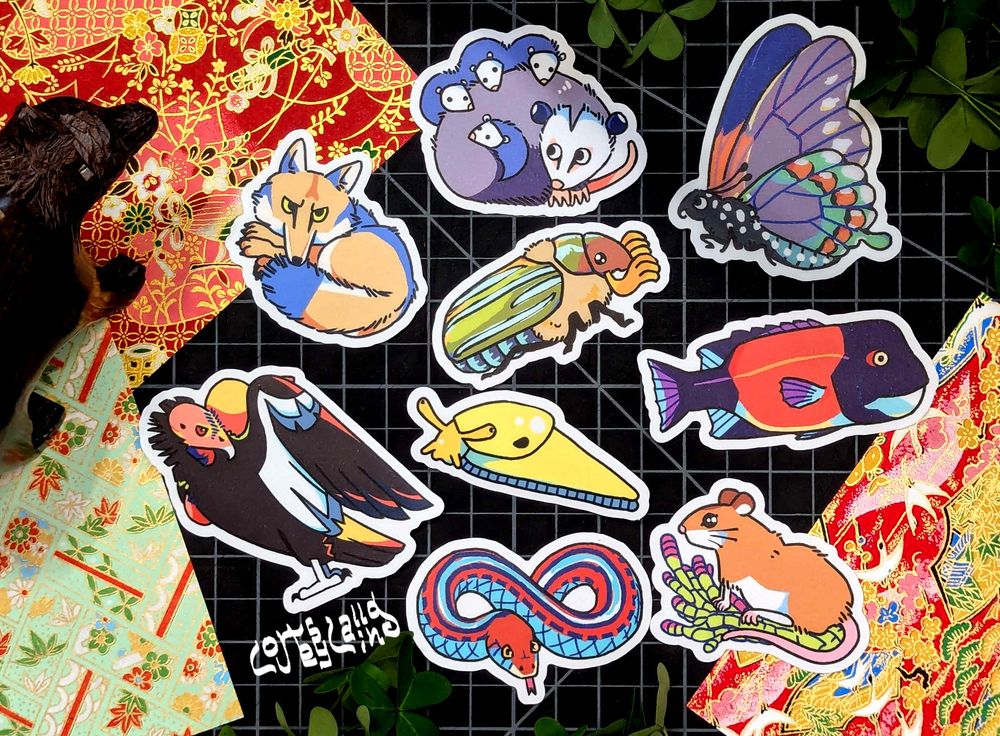 Stickers of: coyote, opossum, pipevine swallowtail, watermelon beetle, California sheephead, condor, garter snake, & mouse