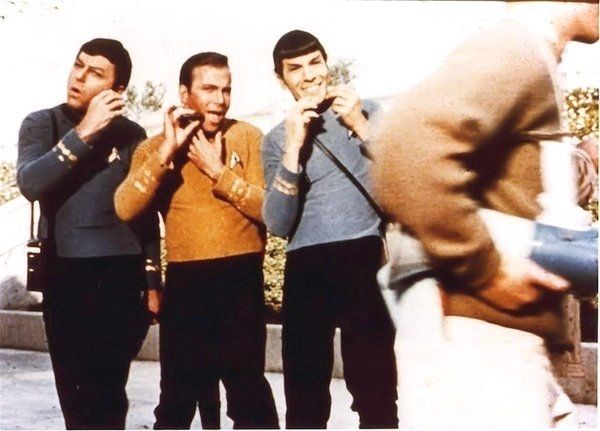 DeForest Kelley, William Shatner, Leonard Nimoy act silly with their communicators on the set of Star Trek (classic series) 