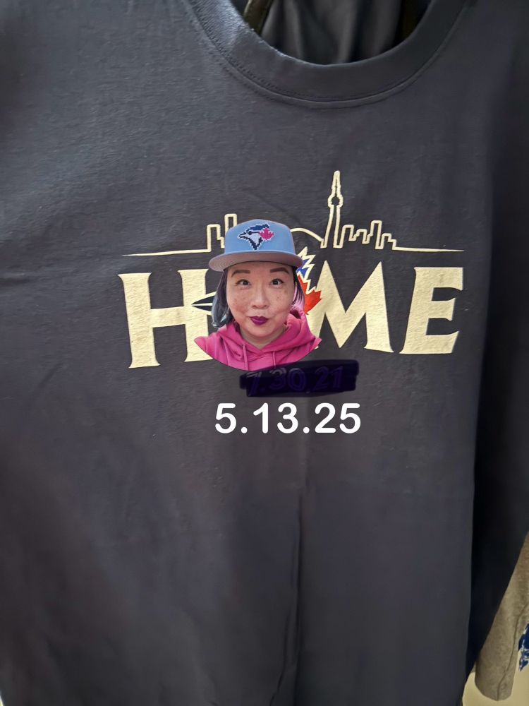 Tshirt that says HOME with the toronto skyline that has my face photoshopped along with today’s date 