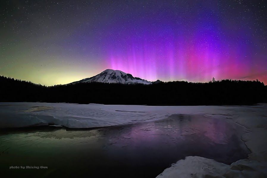 An aurora over a mountain
