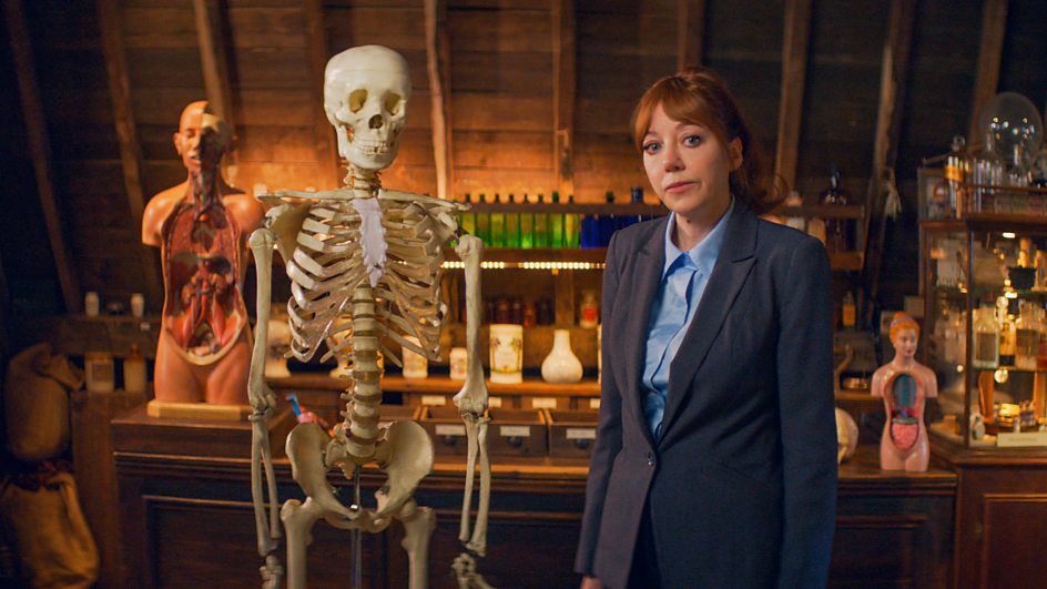 Philomena Cunk stands beside a skeleton. Or is it the other way round?