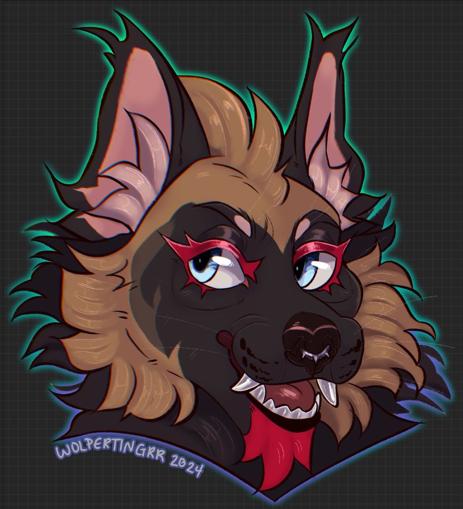 saint the hyena! he is mulitple shades of a beautiful brown with a splash of red in his lashes and beard. he is smiling and looking off to the left