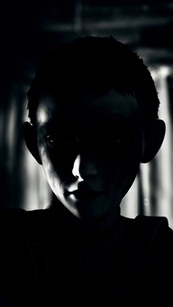 A black and white portrait of a mostly silhouetted Kat from Lost Redcords: Bloom & Rage.