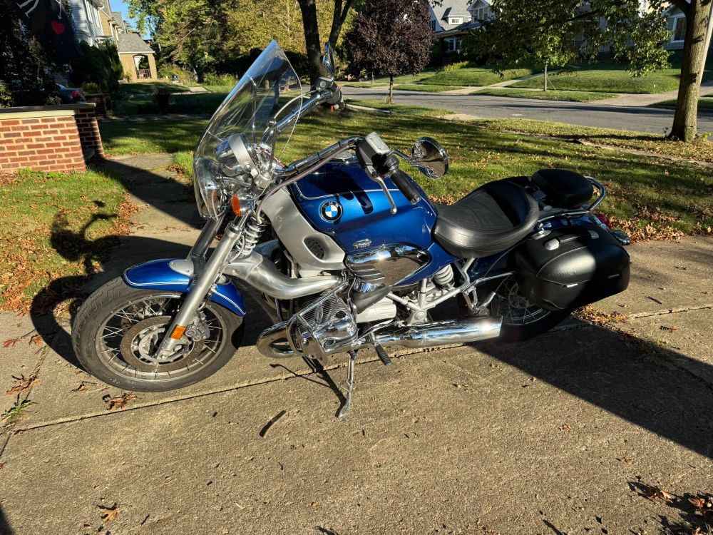 A blue BMW R1200C motorcycle.