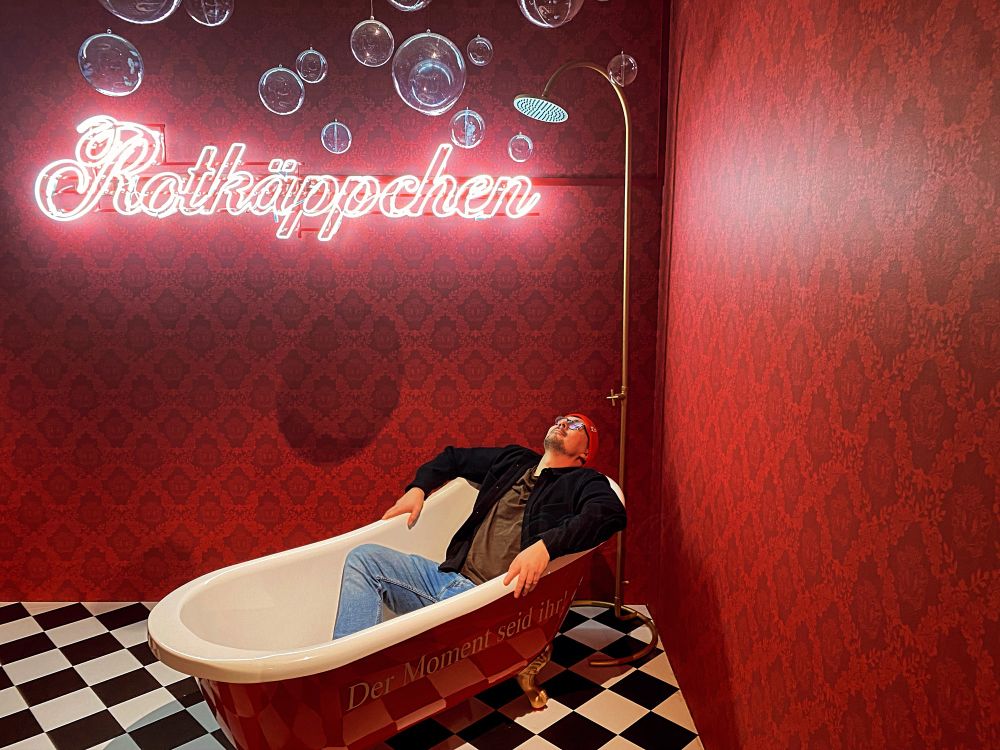 Me lying in a bathtub in Rotkäppchen aparkling wine cellar