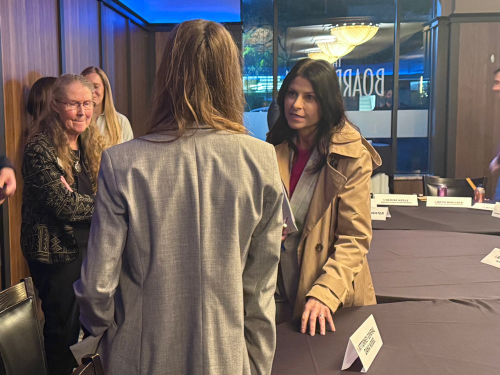 AG Nessel talks with roundtable participant