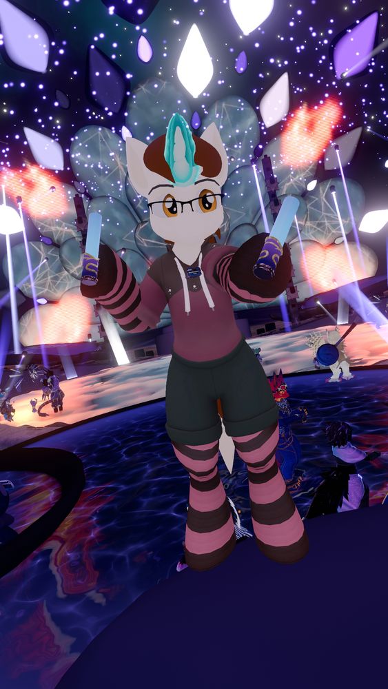 VRChat screenshot of my avatar (a white anthro pony with brown hair, purple hoodie and grey shorts) dancing at Club F.Y.N.N. at Furality.