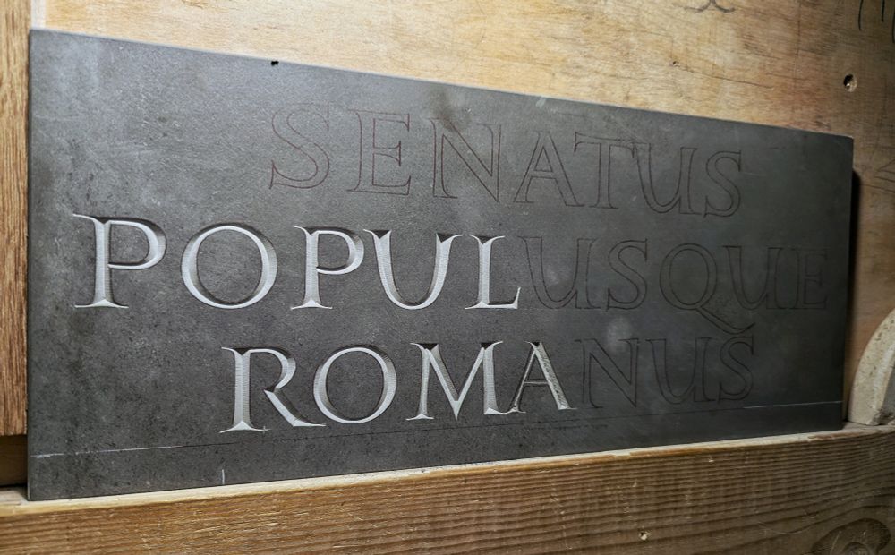 On the easel, Senatus Populusque Romanus. Hand carved #lettering on Welsh slate. #SPQR