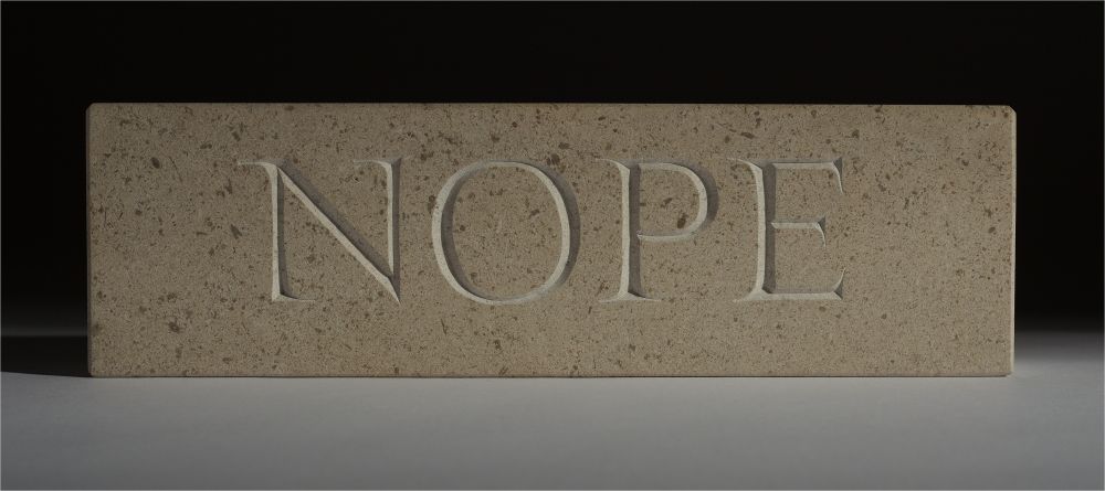 Hand carved #lettering on Hopton Wood limestone. NOPE on one face, NO on the other.