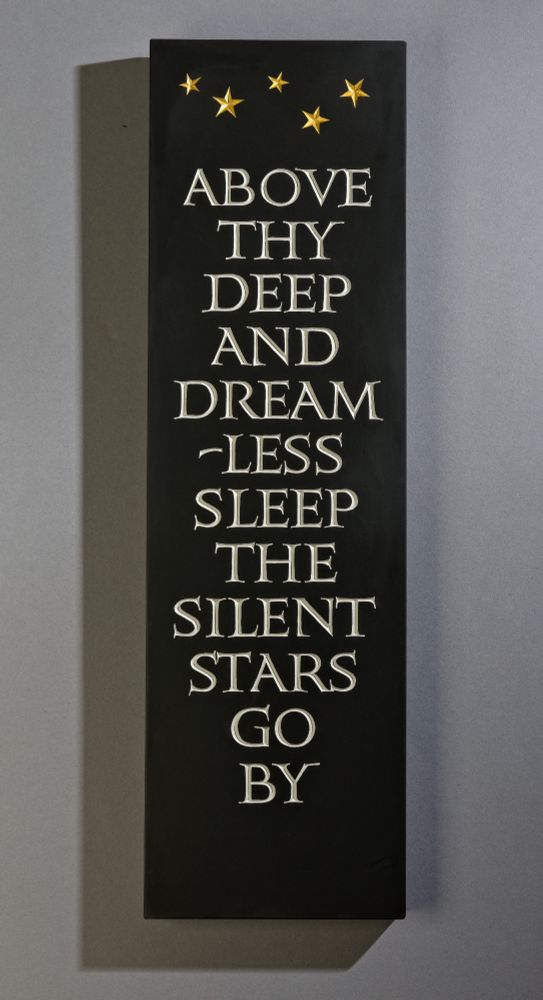 I've been posting about this every 20 minutes for ages and now it is a) complete, b) photographed, c) in the shop, I can finally shut up about it. "Above thy deep and dreamless sleep the silent stars go by". Hand carved #lettering on Welsh slate, gold leaf details.