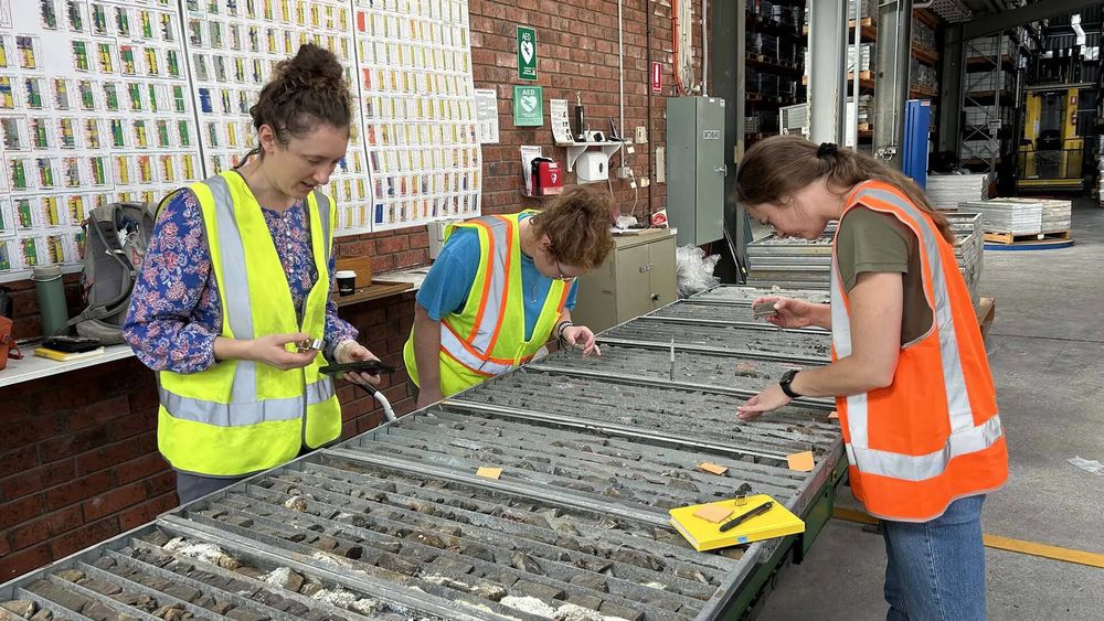From left, geology Assistant Professor Megan Newcombe, master's student Kathryn Bickerstaff '23 and Ph.D. student Kathleen Stepien sort through rocks at Tasmania's Mornington Core Storage Facility.

Photos courtesy of Sarah Penniston-Dorland