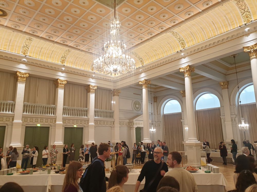 Panorama shot of the city hall of Helsinki as it fills with scuentists.