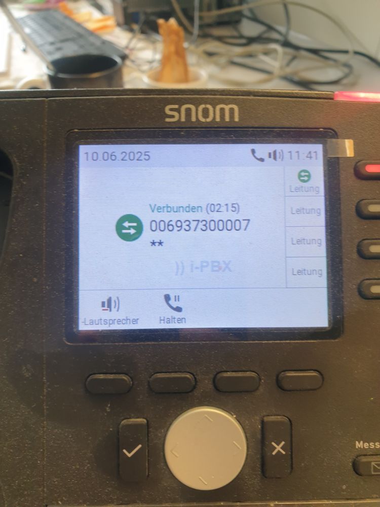 Foto of a telephone screen in our office showing the call has lasted 2 hours and 15 minutes to Customers Service for FinnAir.