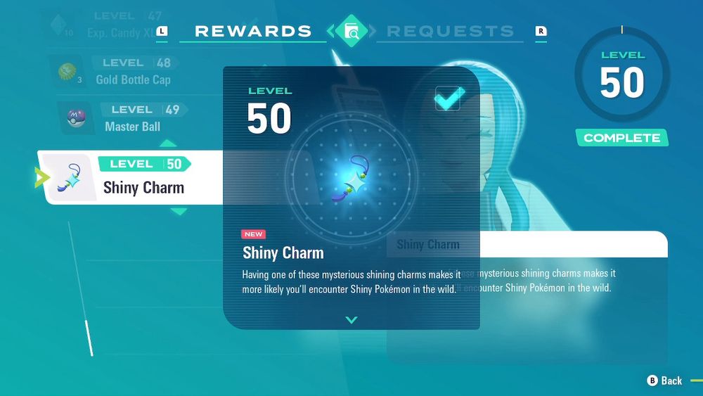 Pokemon Legends Z-A screenshot. It shows the player receiving the shiny charm from Mable after reaching level 50 of her research 