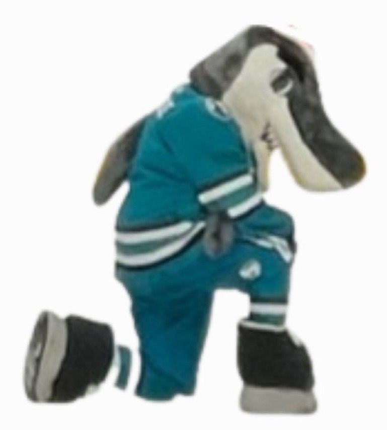 SJ Sharkie, beloved mascot of the San Jose Sharks, kneeling in somber remembrance of the troops.