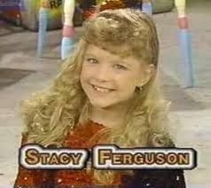 A Young Fergie "Stacy Ferguson" of the Black Eyed Peas from her younger days on Disney.  I'm learning this alt-text schtuph!  You could probably make terrible jokes here and only the visually impaired would see them.