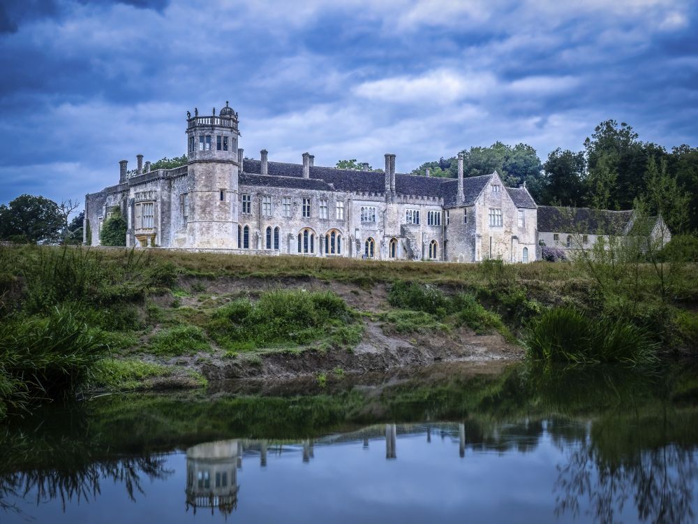 Laycock Abbey from the far bank of the river avon