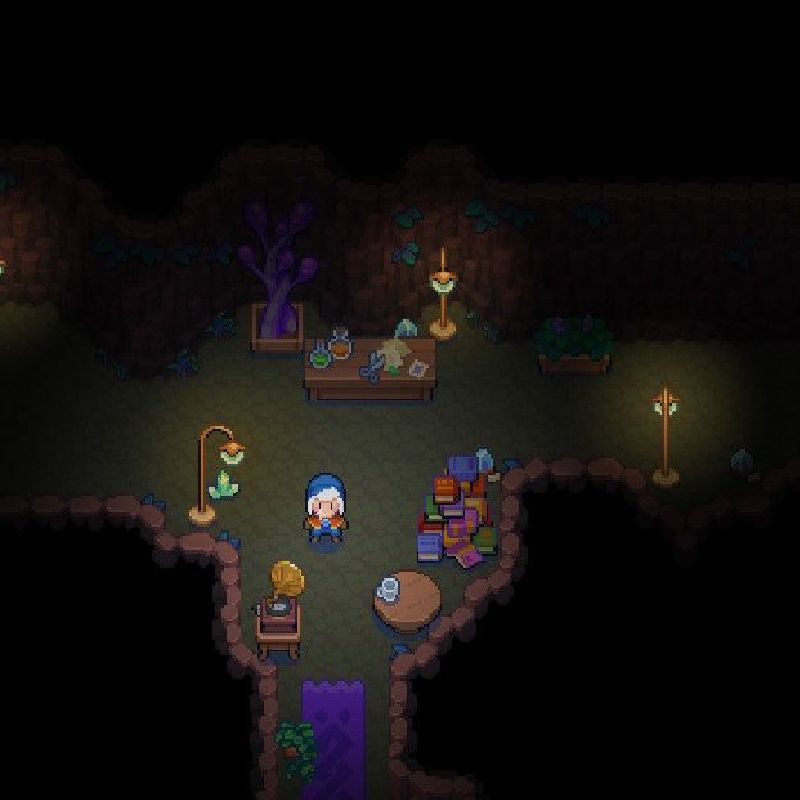 a screenshot from Moonstone Island showing a cozy cave home with warm lighting, rugs, piles of books, and plants
