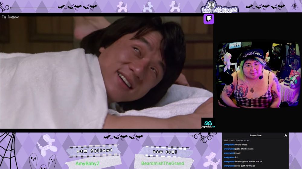 a screen cap of me on the right side of a purple layout with Jackie Chans face on the left from the film The Protector.