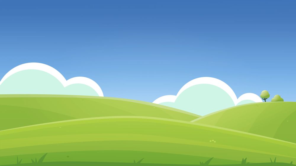 A grassy field on a clear blue day with minimal clouds and a few trees in the distance.