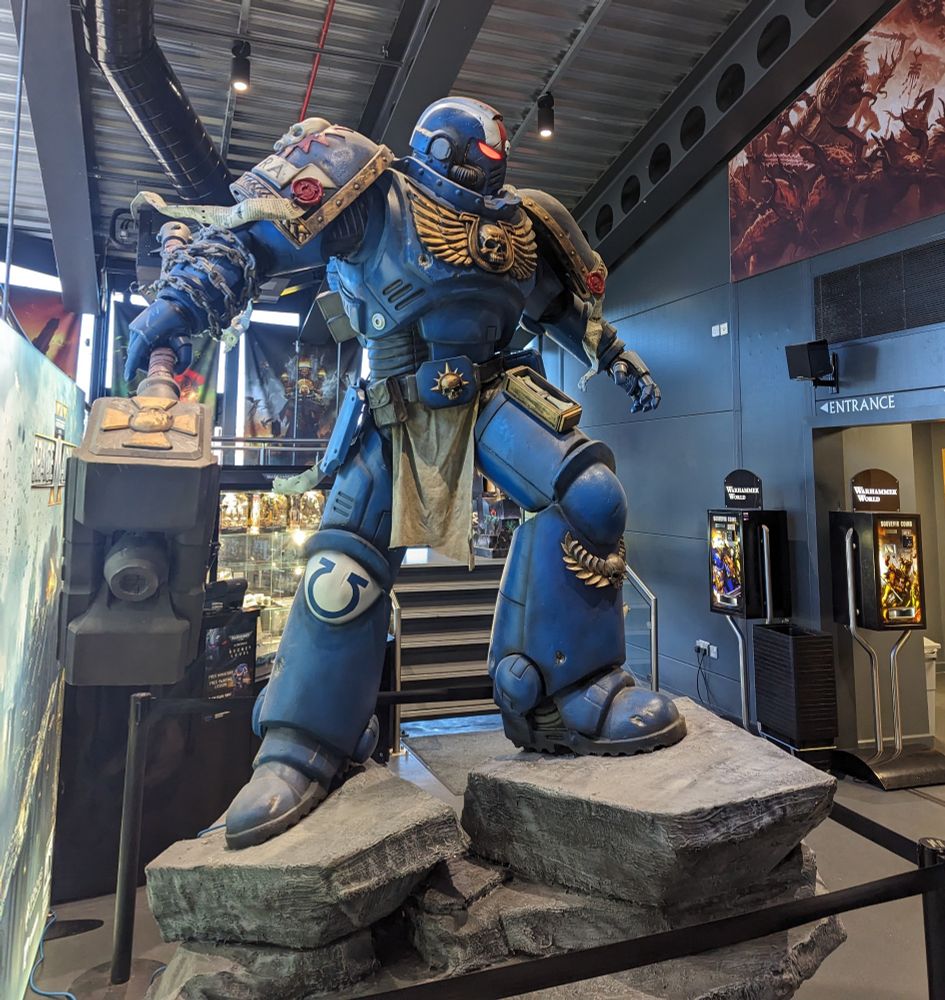 A large statue of a Warhammer 40,000 space marine