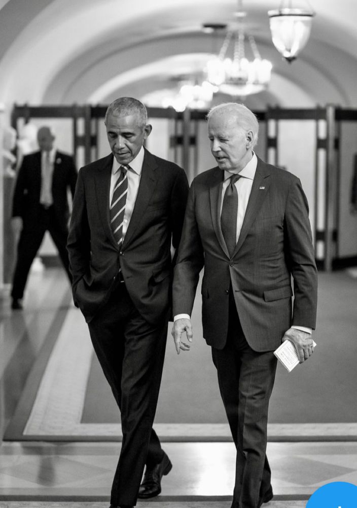 Photo of President Obama and President Biden walking together in the White House deep in discussion!