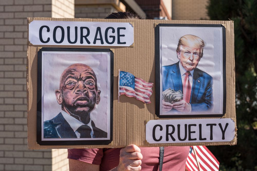 Picture of John Lewis with the label, "Courage" and a picture of Trump with the label, "Cruelty".