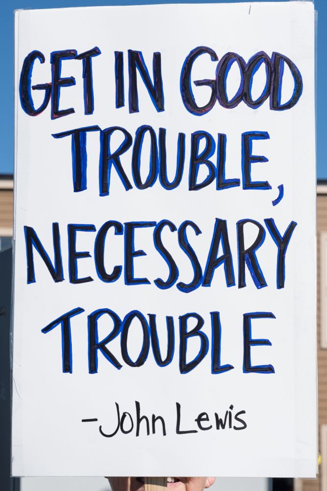 A sign that says, "Get in Good Trouble, Necessary Trouble" by John Lewis.