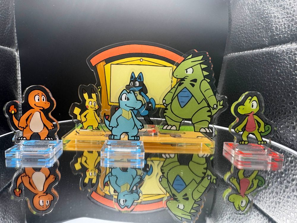 A photo of a set of PMD acrylic standees.