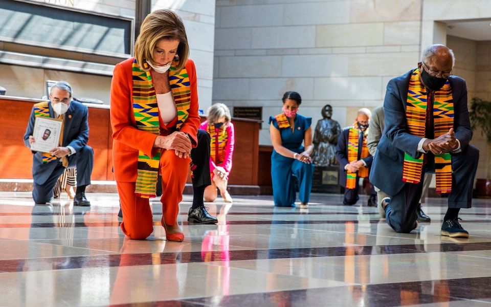 Nancy pelosi in the kente cloth