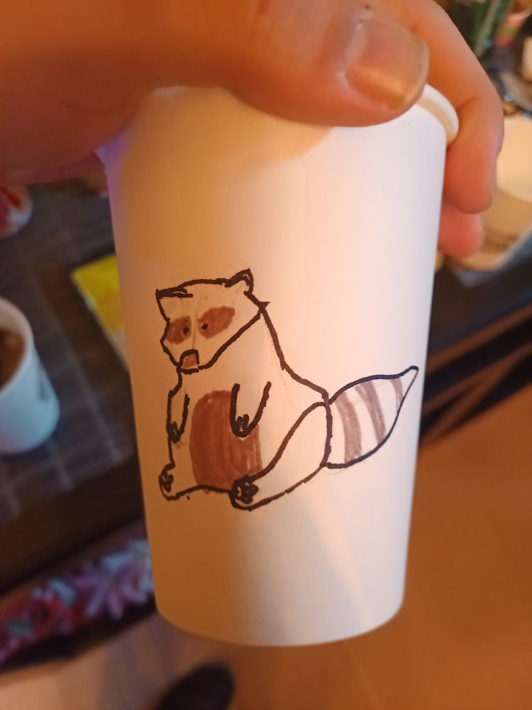 My sister's fursona is a racoon so...... Her cup has one😁