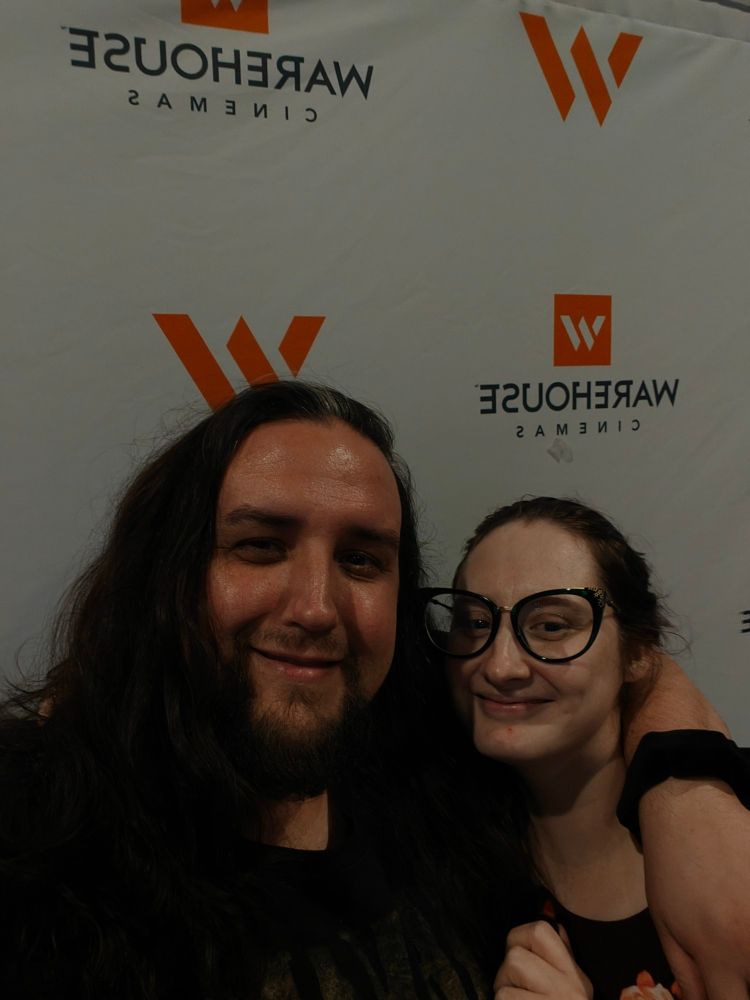 A man and a woman posing 