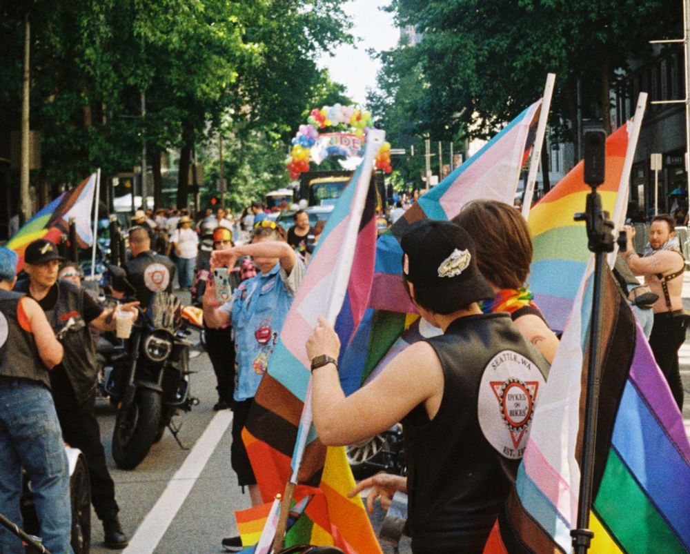 110 format film photograph of the staffing area for the Seattle Pride parade with the Dykes on Bikes contingent.