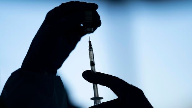 The Alberta government continues to face fierce opposition to plans that will reduce access to publicly funded COVID-19 vaccines in the province.