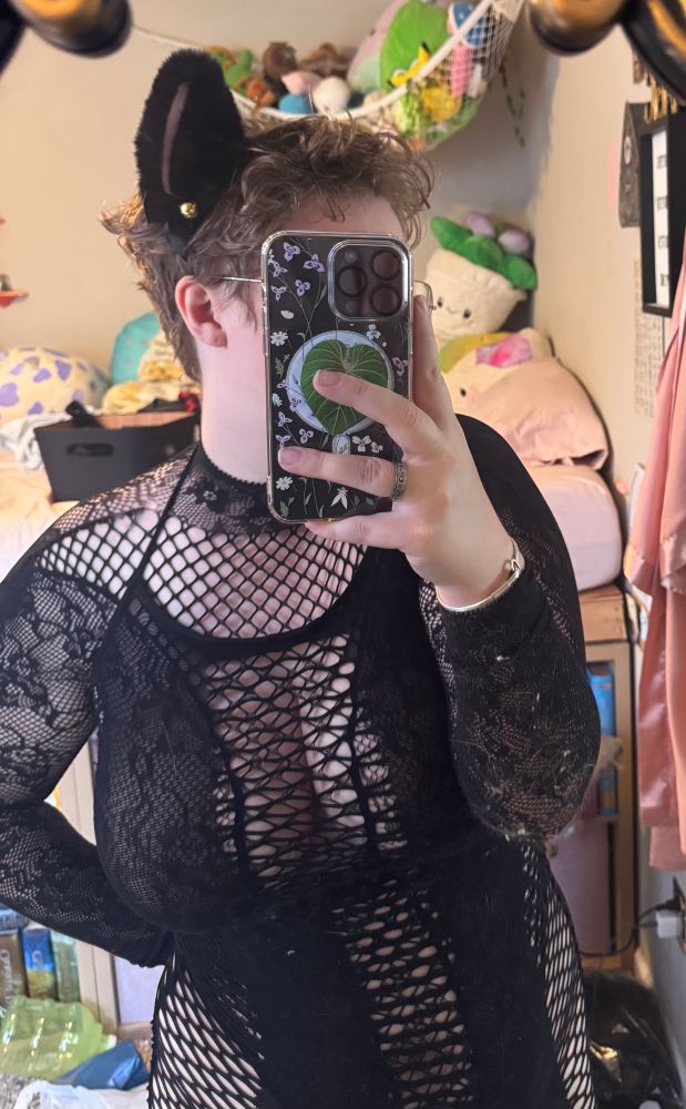 Edie is wearing her fishnet dress with cat ears