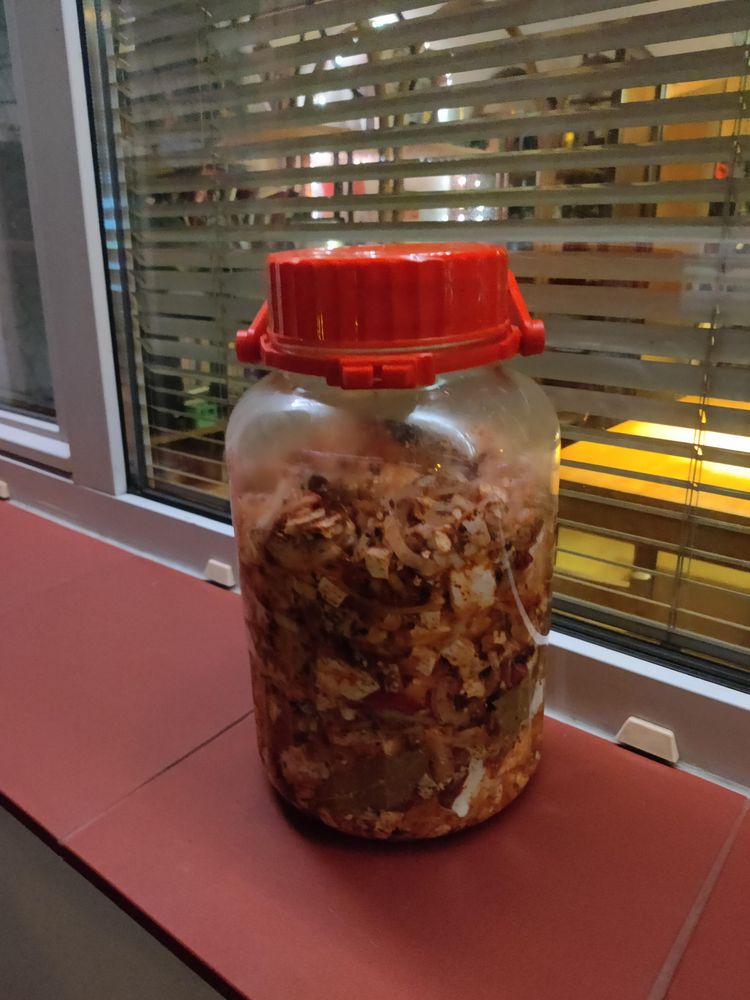 Huge jar of pickled cheese