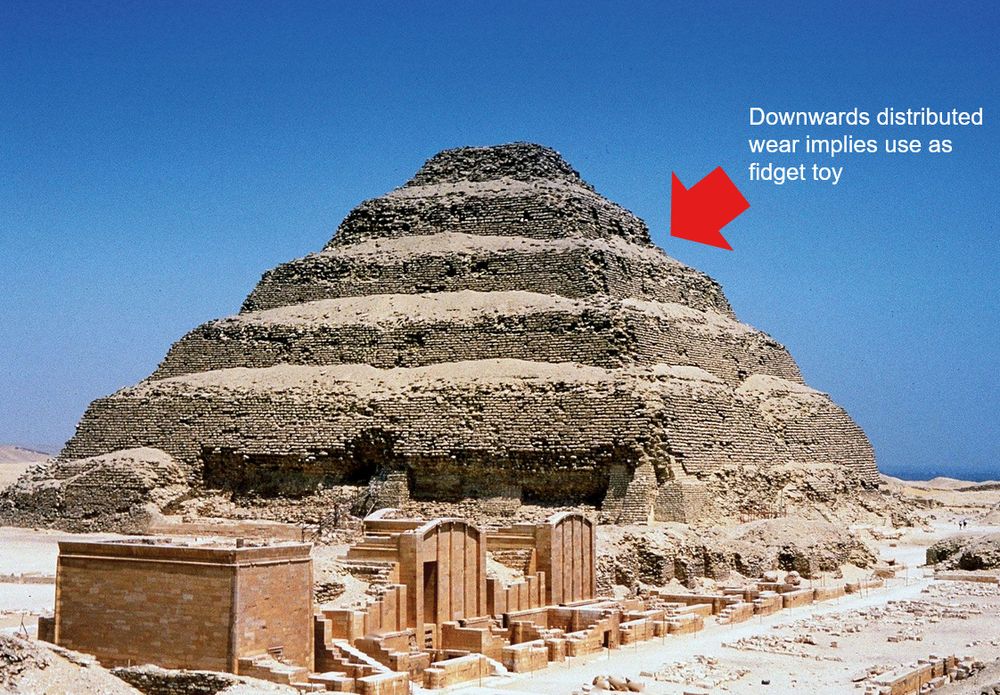 an image of the Step Pyramid of Djoser. Text pointing at it reads "Downwards distributed wear implies use as fidget toy"